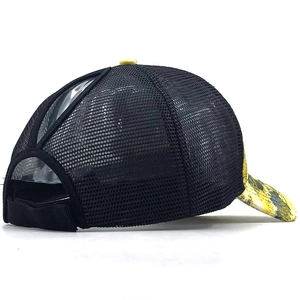 Detail of breathable mesh baseball cap with camouflage brim and ponytail hole