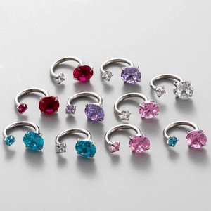Polished titanium steel horseshoe ear studs with colorful sparkling zircon gemstones