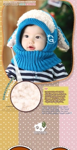 Detail of baby hooded scarf with blue knit texture and soft faux fur puppy ear accents