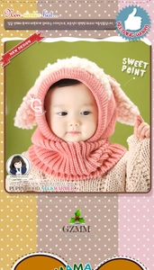 Close-up of pink knitted baby hooded scarf with cute puppy ears for winter warmth