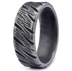 Detailed view of retro punk ring featuring irregular rock texture in 316 stainless steel