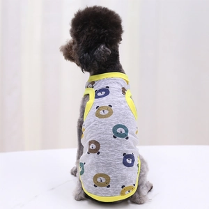 Detail of grey pet vest with cartoon bear prints and yellow elastic piping for small dogs