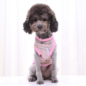 Close-up of pink pet cooling vest with cartoon rabbit and candy prints for small dogs