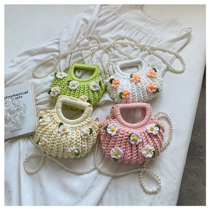Handmade woven shell bags in green, white, pink and beige with daisy and pearl straps