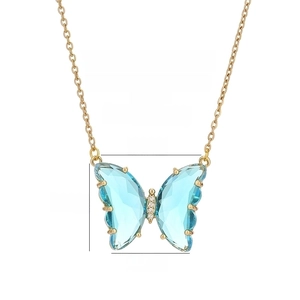 Detail view of blue crystal butterfly pendant with dimensions and stainless steel chain
