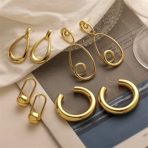 Minimalist Copper Gold Plated Hollow Teardrop Geometric Earrings For Women Niche Design Fashionable Spiral Hoop Earrings Jewelry