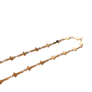 Gold plated stainless steel necklace featuring a continuous cross link choker design