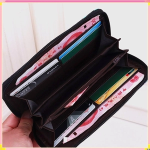 Internal structure of black long zipper wallet featuring card slots and coin pocket