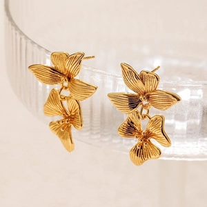 Elegant 18K gold-plated irregular floral stud earrings featuring a triple-layer petal design