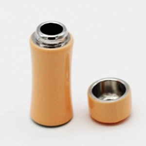 Detailed macro view of 1:12 dollhouse miniature plastic thermos with silver inner lining