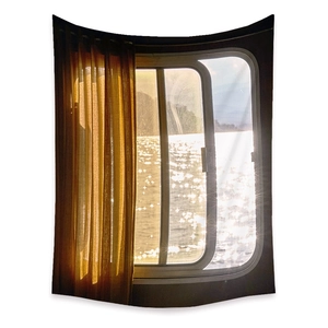 Detail of bohemian sunset landscape tapestry showing rich fabric texture and print quality