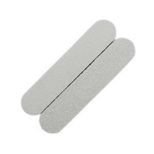 Detailed view of two professional grey oval nail files with fine sand grit texture