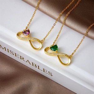 Elegant gold titanium steel necklace featuring infinity heart pendants with purple and green gems