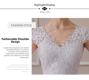 Detailed view of the V-neckline with floral lace embroidery and pearl beads on the wedding dress