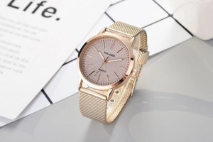 Detail of Yolako rose gold women's watch with pink sand dial and metallic mesh strap