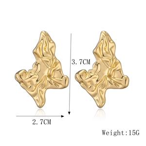 Detail view of 18K gold-plated irregular bow earrings with 3.7x2.7cm size specs