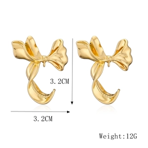 Detailed view of gold bow earrings with 3.2cm size and 12g weight specifications