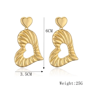 Detail showing 6cm heart earrings dimensions with gold-plated hollow metal design