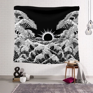 Detailed texture of black and white Great Wave tapestry hanging on a white brick wall