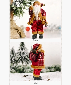 Front and side views of a decorative Santa Claus figurine with lamp and gift bag