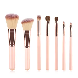 Detailed view of 7-piece makeup brush set with pink handles and rose gold ferrules