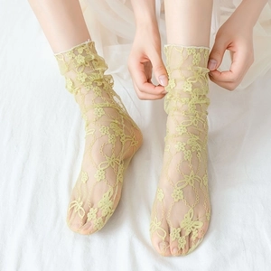 Pale yellow sheer floral lace crew socks for women featuring elegant knit flower patterns