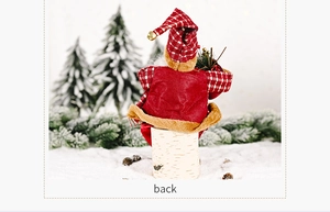 Detailed back view of a plush Santa Claus figurine with red plaid hat and rustic base