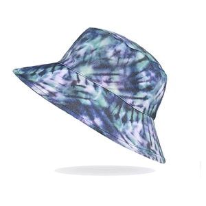 Tie-dye cotton bucket hat with blue, purple and green print for sun protection