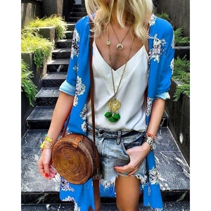 Women's bohemian blue floral chiffon cardigan paired with casual summer shorts