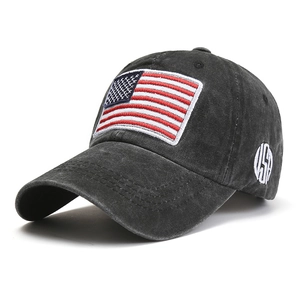 Close-up of US flag patch and USA embroidery on vintage washed cotton baseball cap