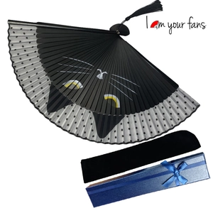 Close-up of a black Totoro folding fan with a gift box and soft velvet storage sleeve