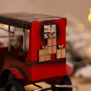 Retro red metal truck Christmas ornament with wooden gift box and warm bokeh light