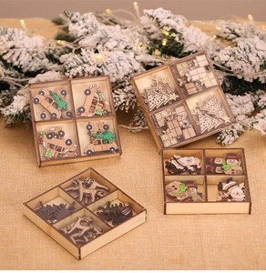 Close-up of DIY wooden Christmas tree pendants in a natural wood storage box