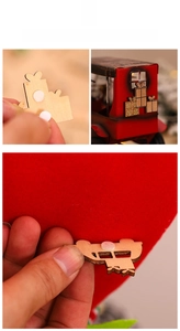 Detailed view of DIY wooden Christmas ornaments with adhesive backing for crafts