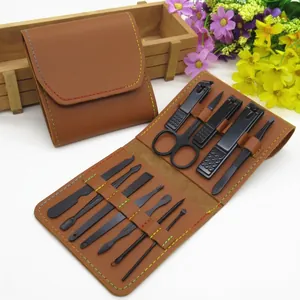 12-piece black matte manicure set with premium brown leather case and colored stitching
