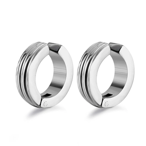 Close-up of silver titanium steel ear clips with minimalist triple-line circular design