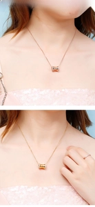 Detail showing rose gold and gold cylindrical waist pendants with micro-pave crystals