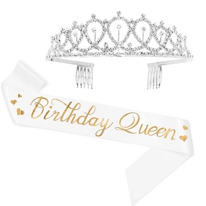 Detail of silver rhinestone crown and white satin Birthday Queen sash set