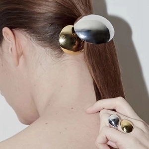 Metallic eggshell style hair clip and ring set with polished two-tone gold and silver finish