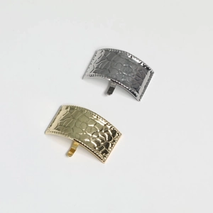 Gold and silver metal hair hooks with hammered texture for elegant ponytail styling