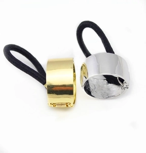 Minimalist gold and silver metal ponytail cuff hair ties with smooth polished finish
