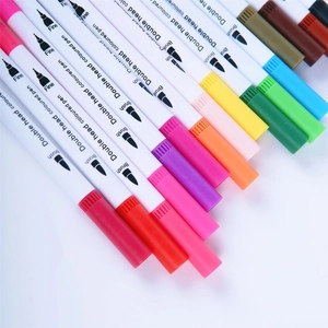 Detail of dual-tip markers showing brush and fine points in vibrant colors