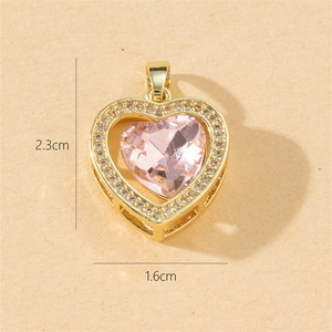 Detail of copper zircon heart pendant showing dimensions of 2.3cm height and 1.6cm width