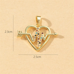Detailed view of gold heart pendant with multicolor zircon and heart rate arrow design