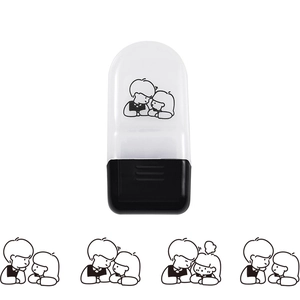 Detail showing cartoon couple roller stamp with black ink imprint on white background