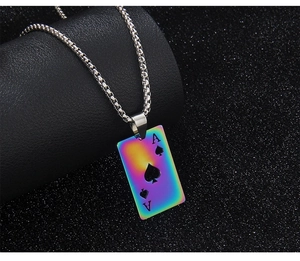 Close-up of rainbow gradient Ace of Spades card pendant with silver box chain