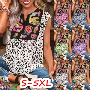 Detail of leopard print V-neck tank top featuring ethnic floral embroidery in various colors