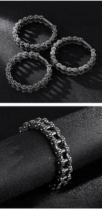 Detail of industrial punk bicycle chain bracelets in vintage silver stainless steel