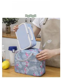 Detailed view of spacious flamingo print insulated lunch bag with portable bento box