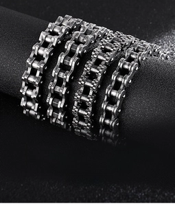 Macro shot of double-row vintage silver bicycle chain bracelet in punk biker style